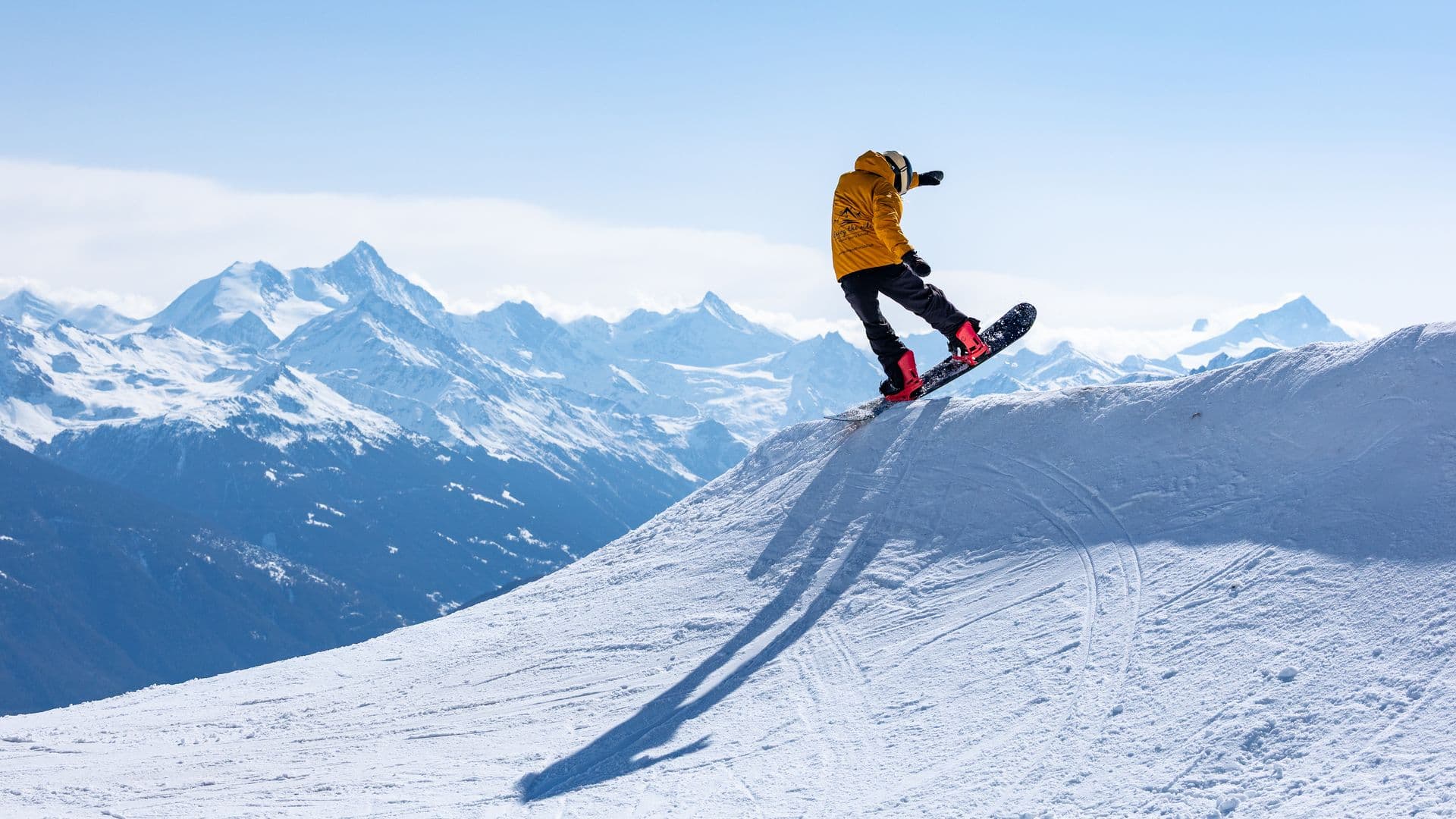 Enjoy the Ride instructor stumping a trick above Crans-Montana